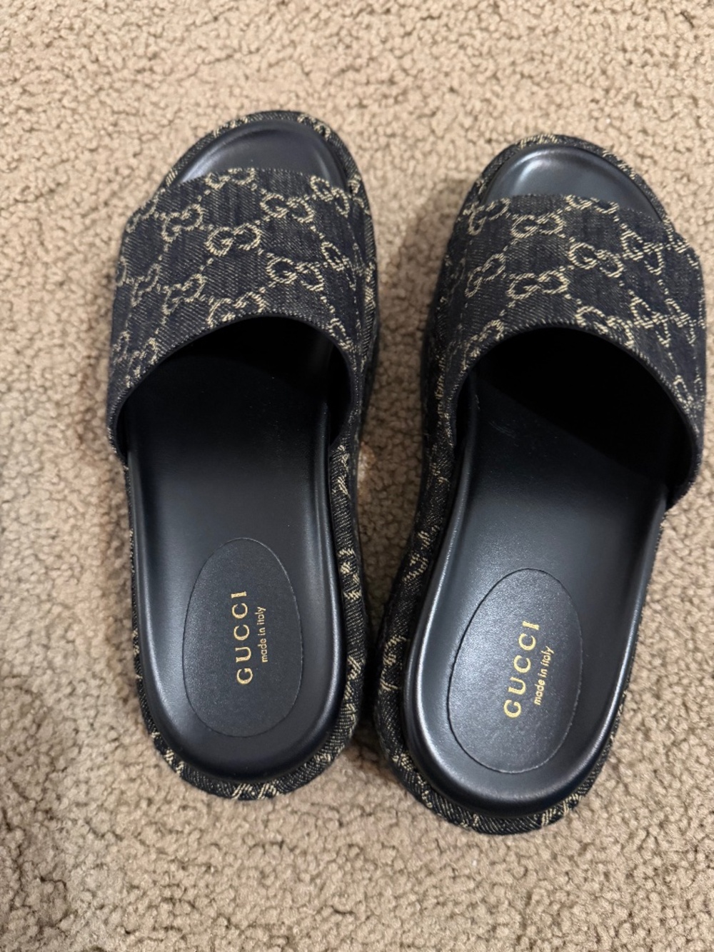 Gucci Angelina platform slide sandals in black GG jacquard denim.